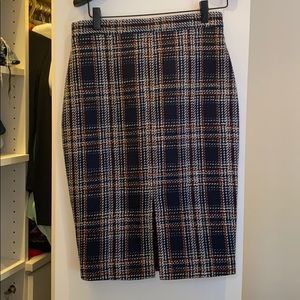 Slit front mid length tweed skirt